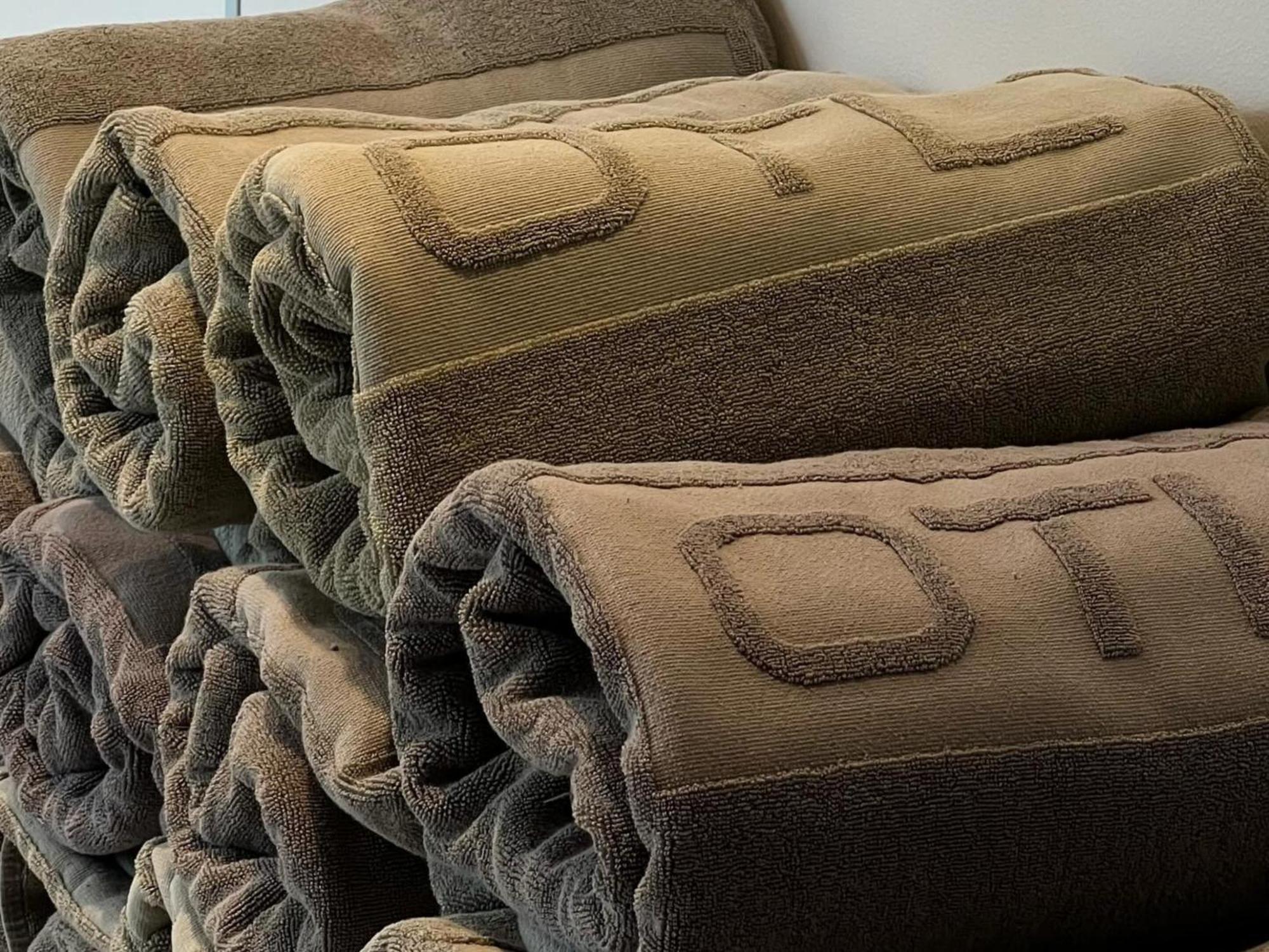 Otl Gouverneur 셔브룩 외부 사진 A stack of rolled up futons